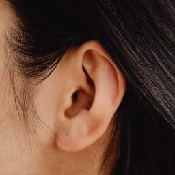 Close-up of a woman's ear.
