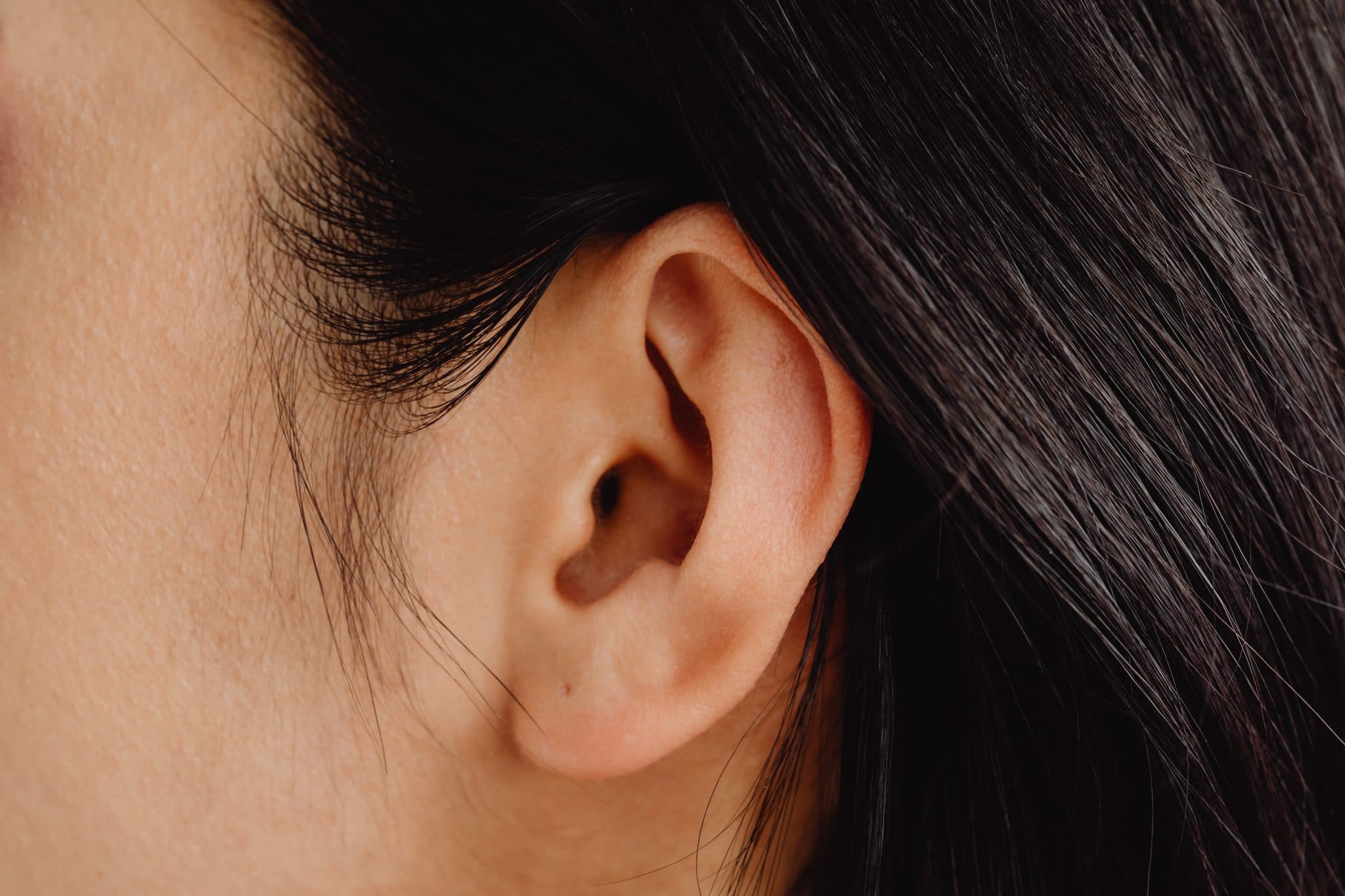 Close-up of a woman's ear.