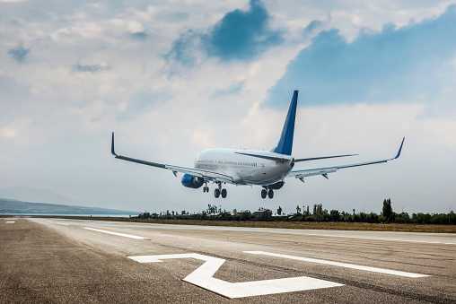 Airplane landing on the runway